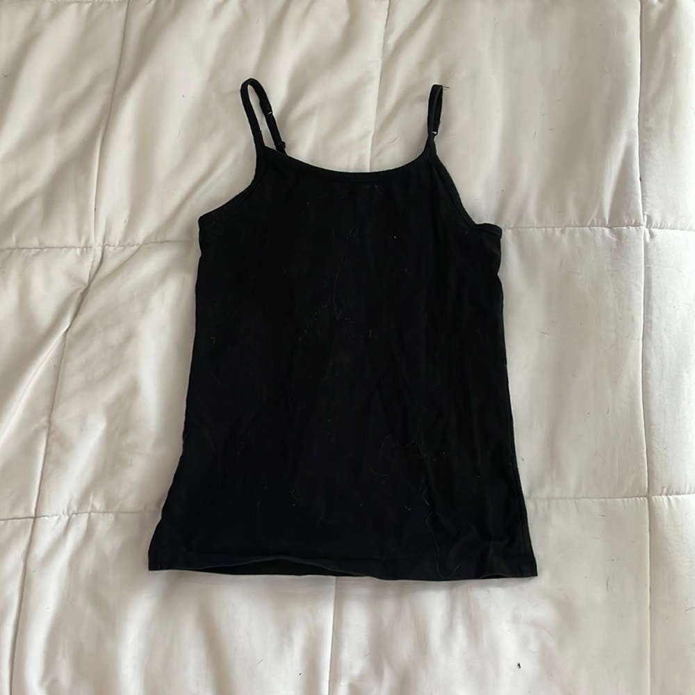 This is a black tank top for 7 - 8 year olds. It doesn’t fit my anymore.